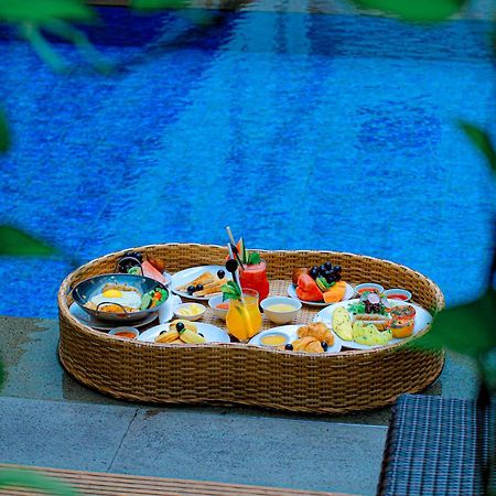 Hotel Swiss-Belexpress Kuta Legian Extérieur photo
