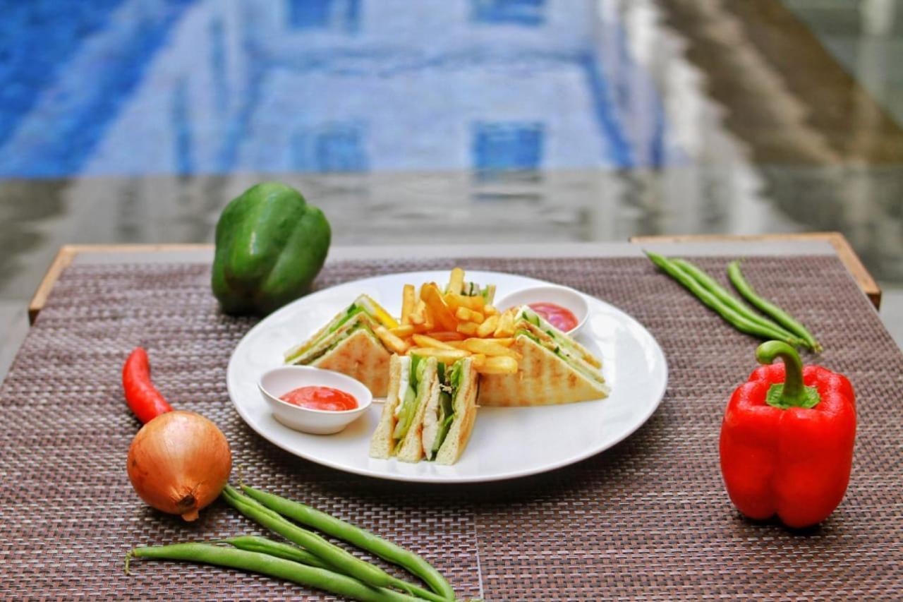 Hotel Swiss-Belexpress Kuta Legian Extérieur photo